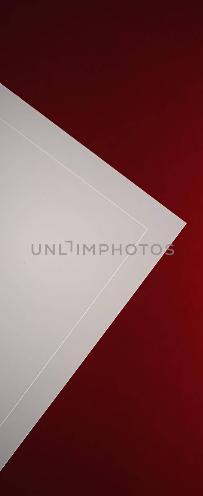 Blank A4 paper, white on red background as office stationery flatlay, luxury branding flat lay and brand identity design for mockup.