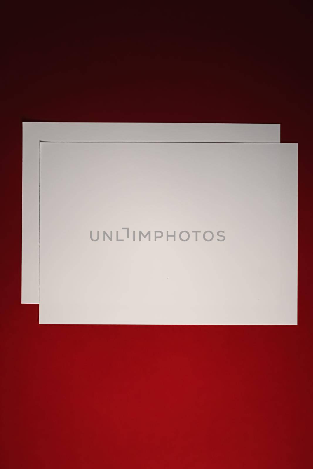 Blank A4 paper, white on red background as office stationery flatlay, luxury branding flat lay and brand identity design for mockup.