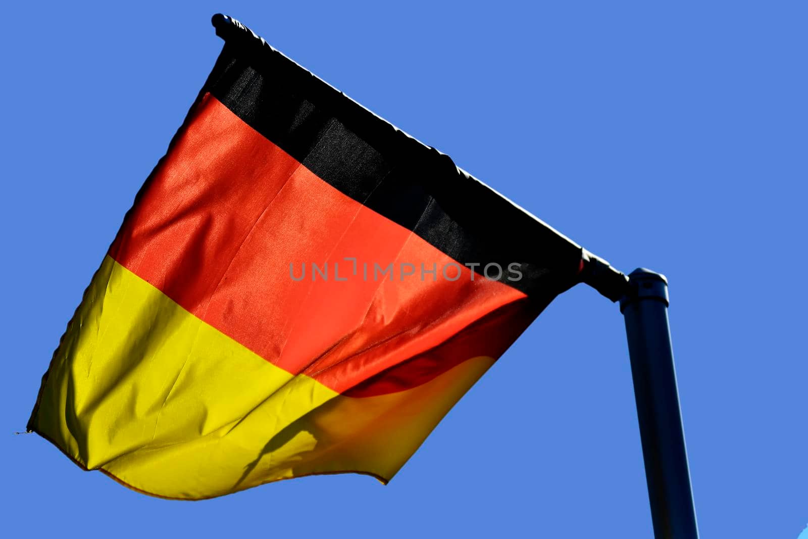 Banner of Germany on a blue sky by Jochen