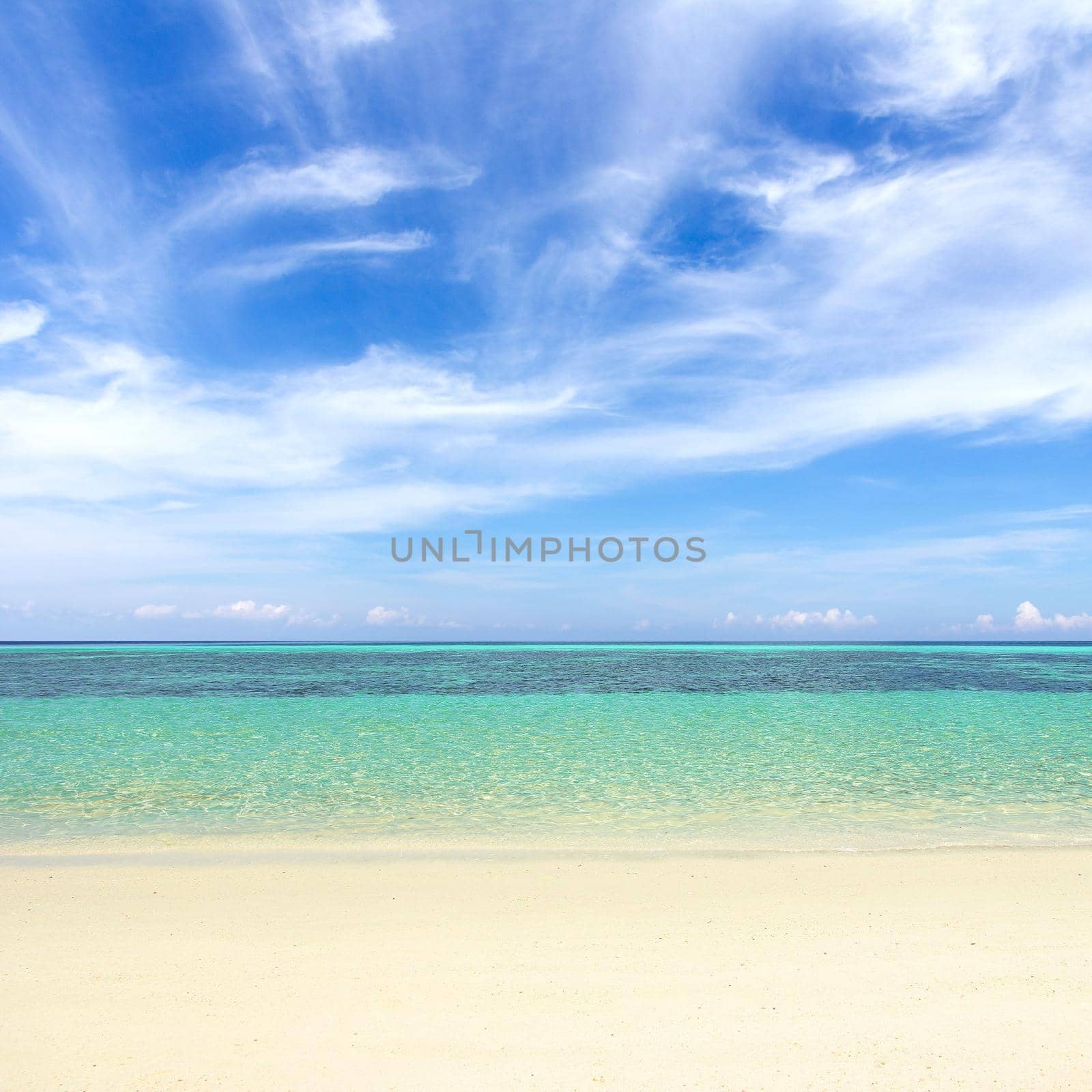 Beaches, crystal clear water, blue sky as background.
