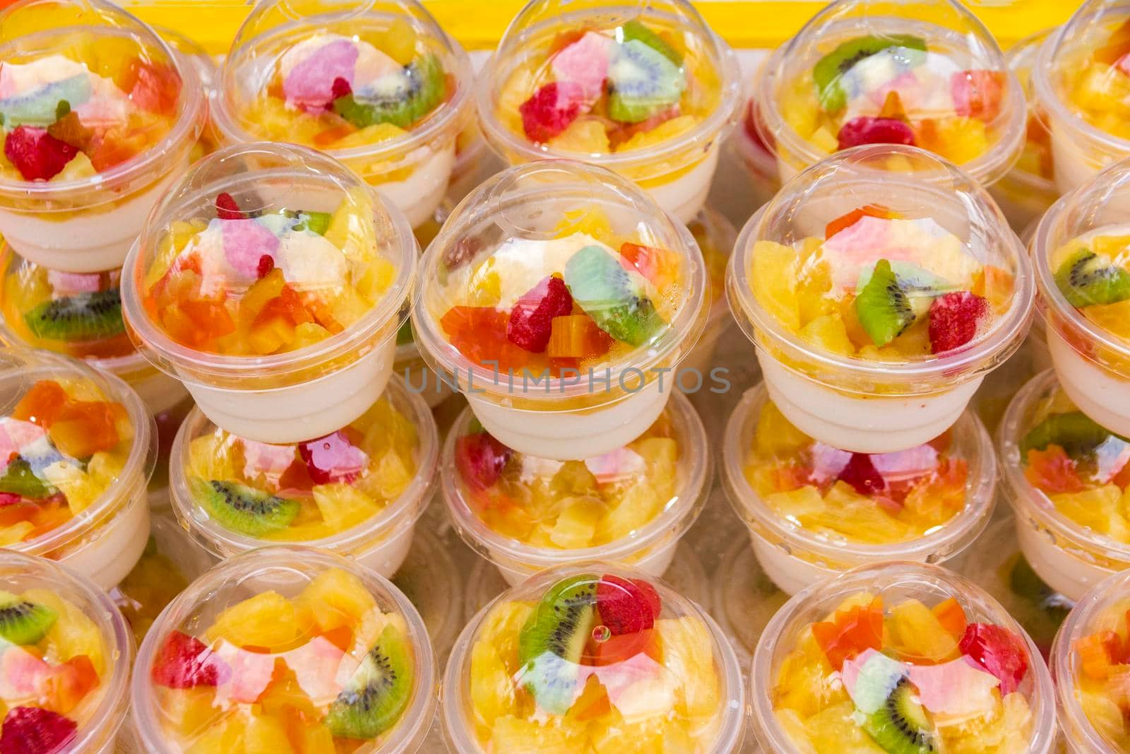 Fruit dessert in a cup of delicious healthy snacks.