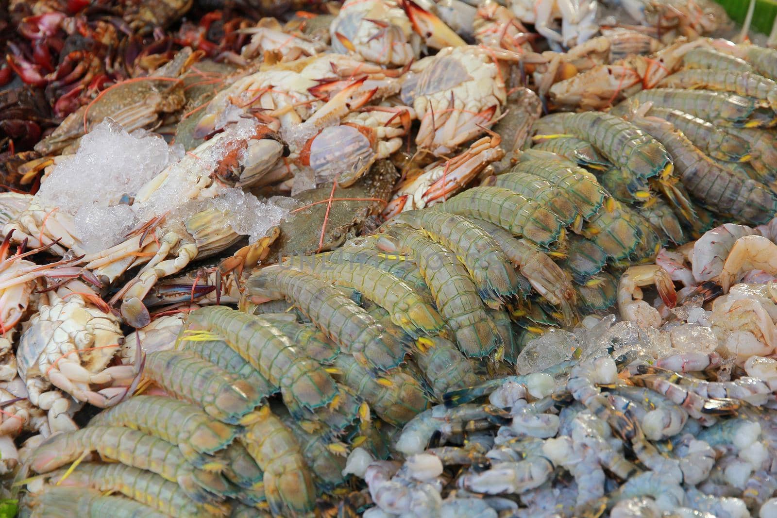 A fresh seafood market in the panel.