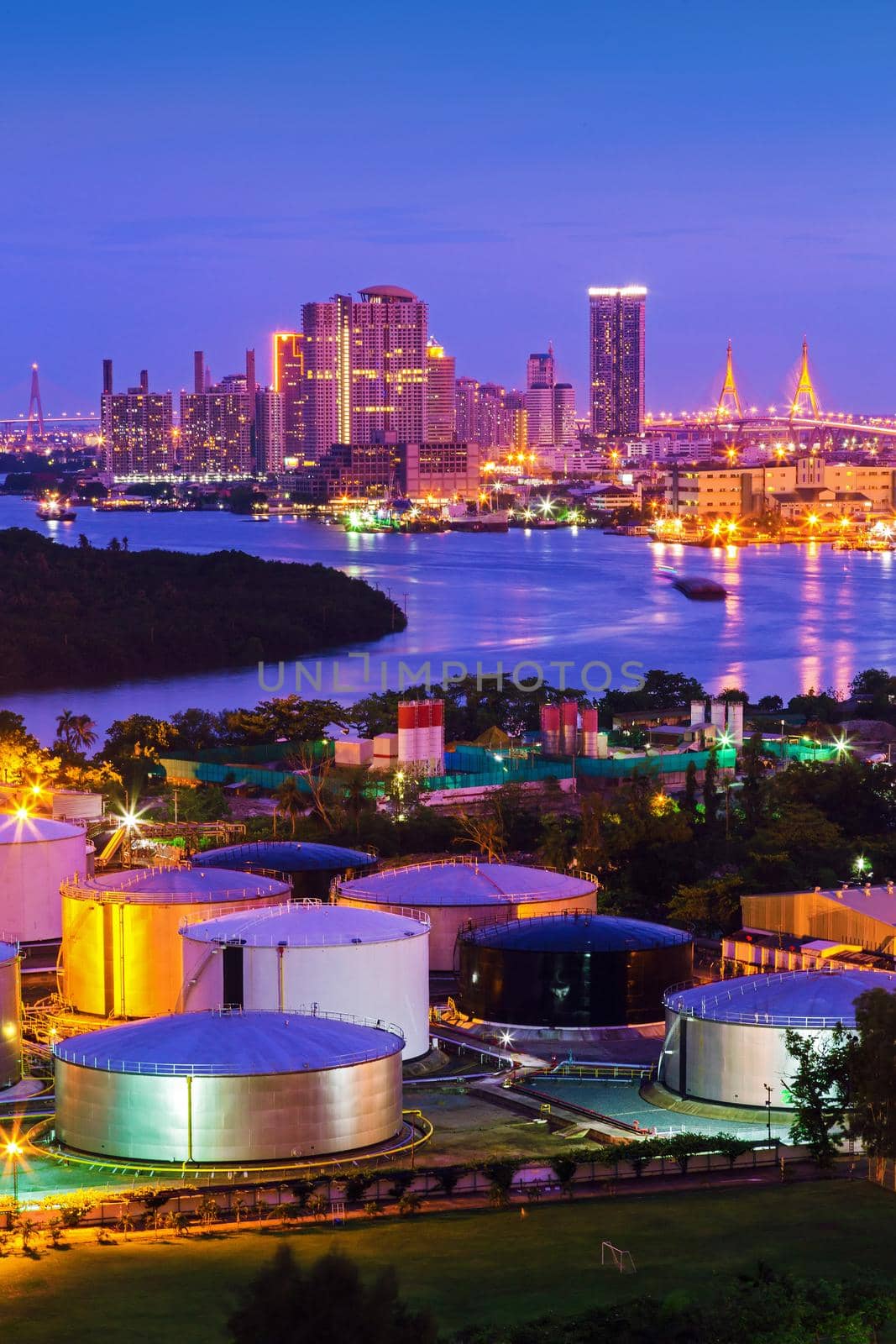 Oil Storage tanks with urban background in Bangkok Thailand