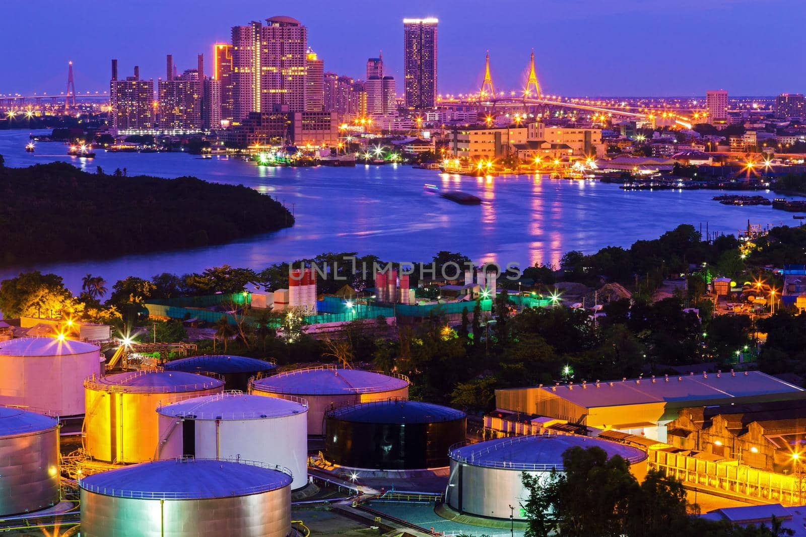 Oil Storage tanks with urban background in Bangkok Thailand