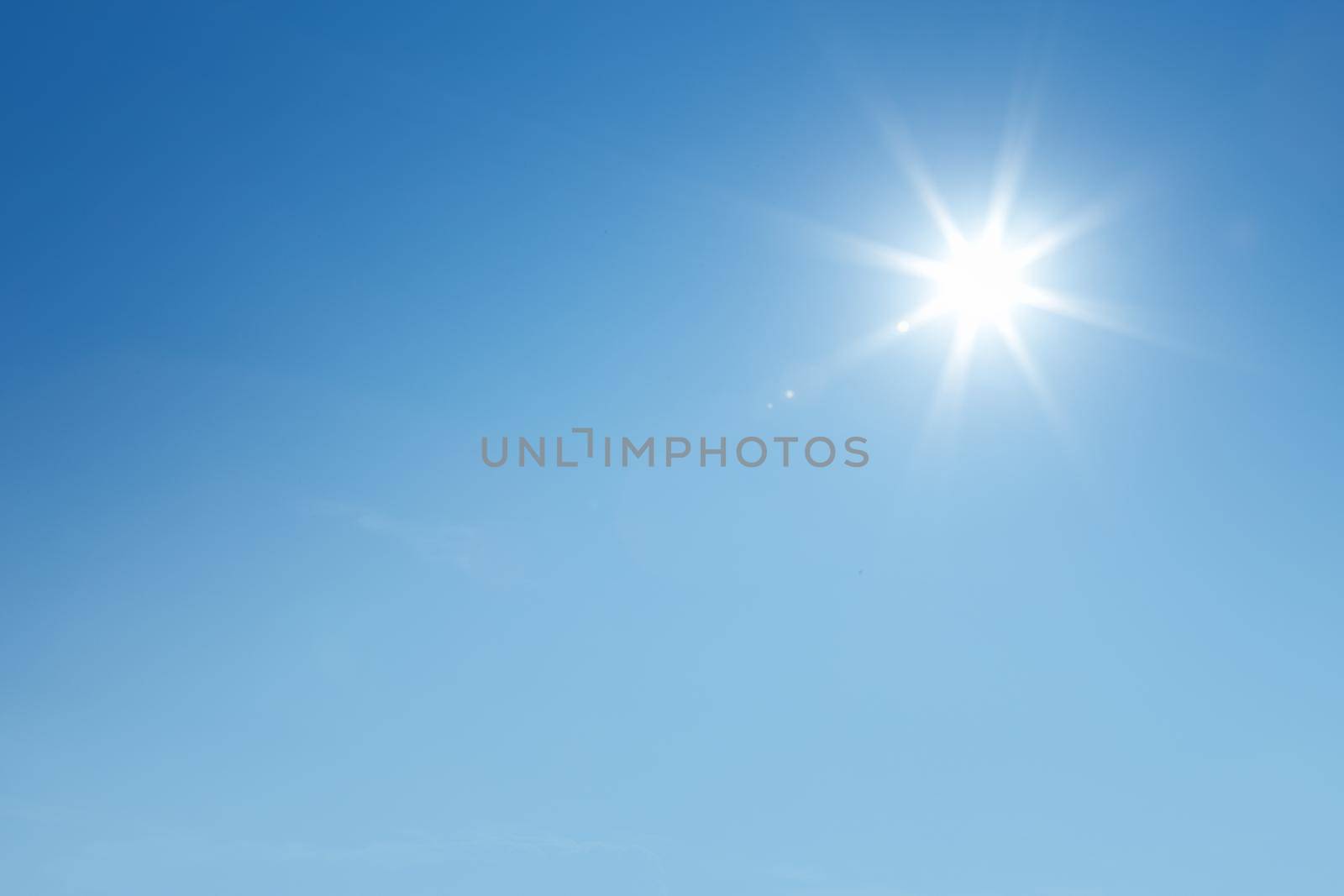 The sun shines bright in the daytime in summer. 