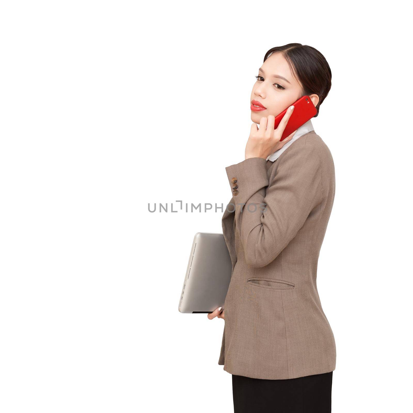 business woman with a laptop and cell phone.isolated on white