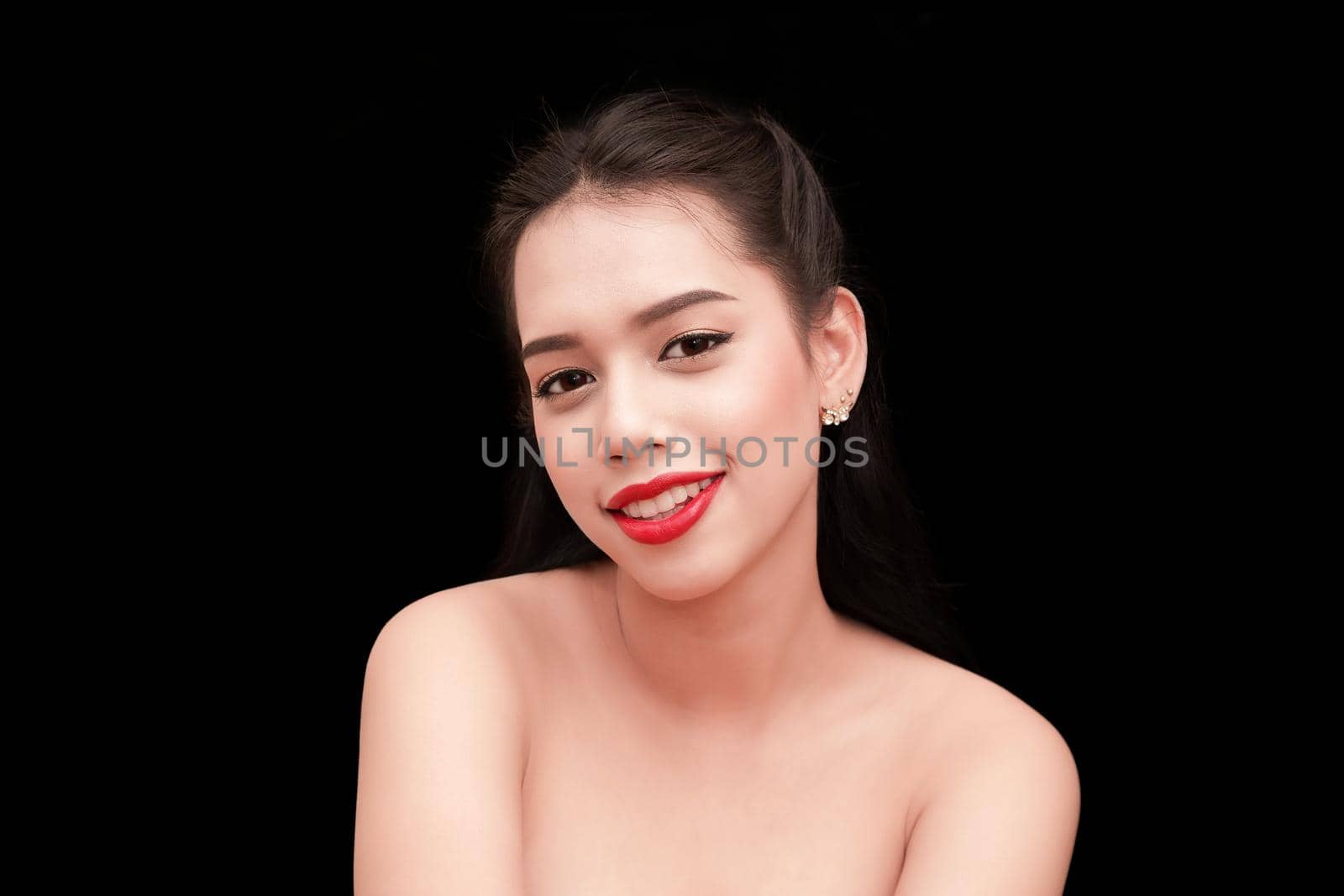 Young beautiful woman face portrait with healthy skin