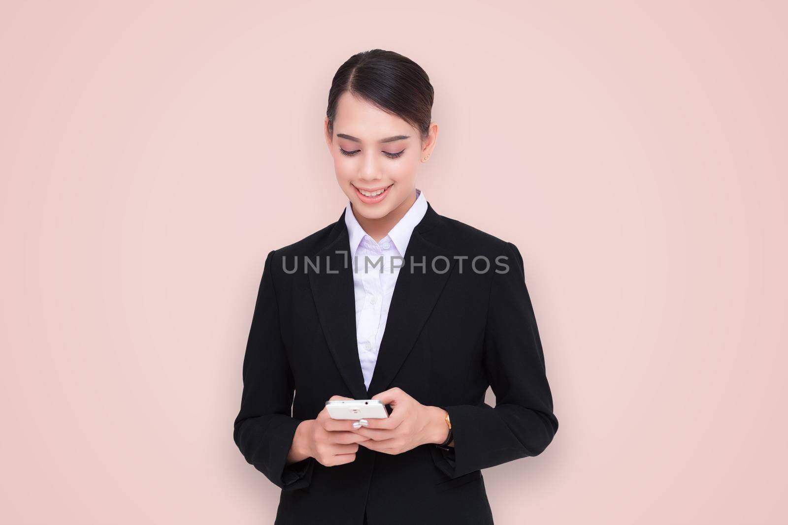 Young Business woman smile use the mobile phone.