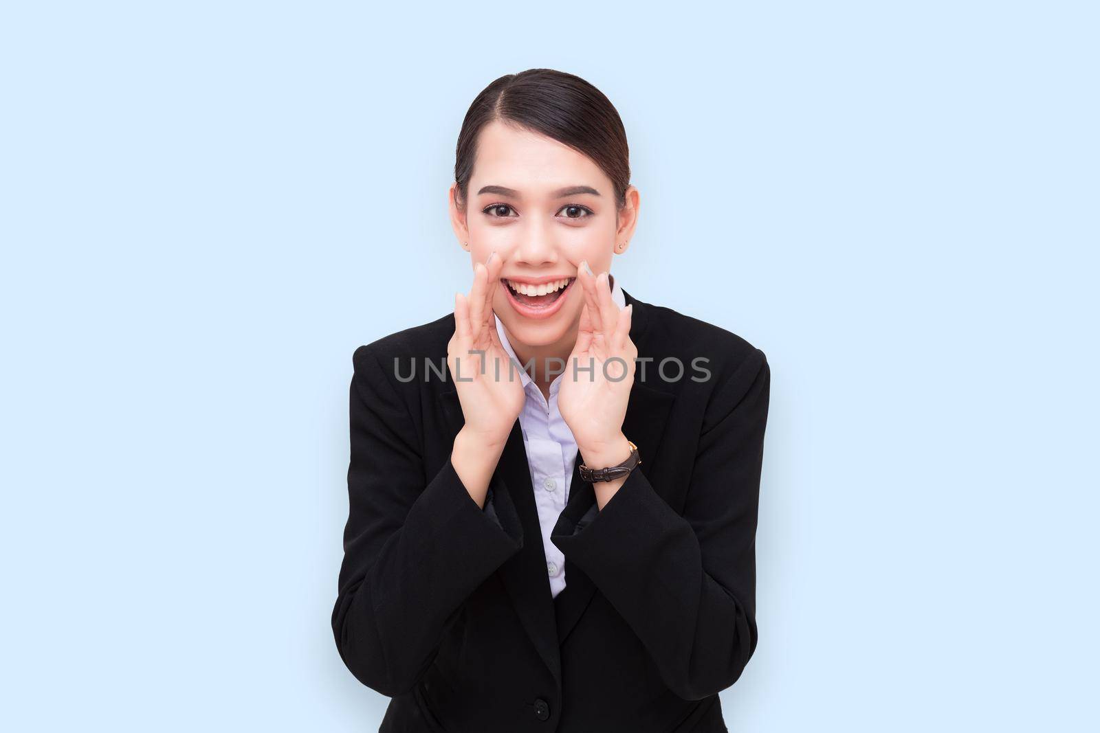 portrait of pretty businesswoman loud screaming or calling out to someone