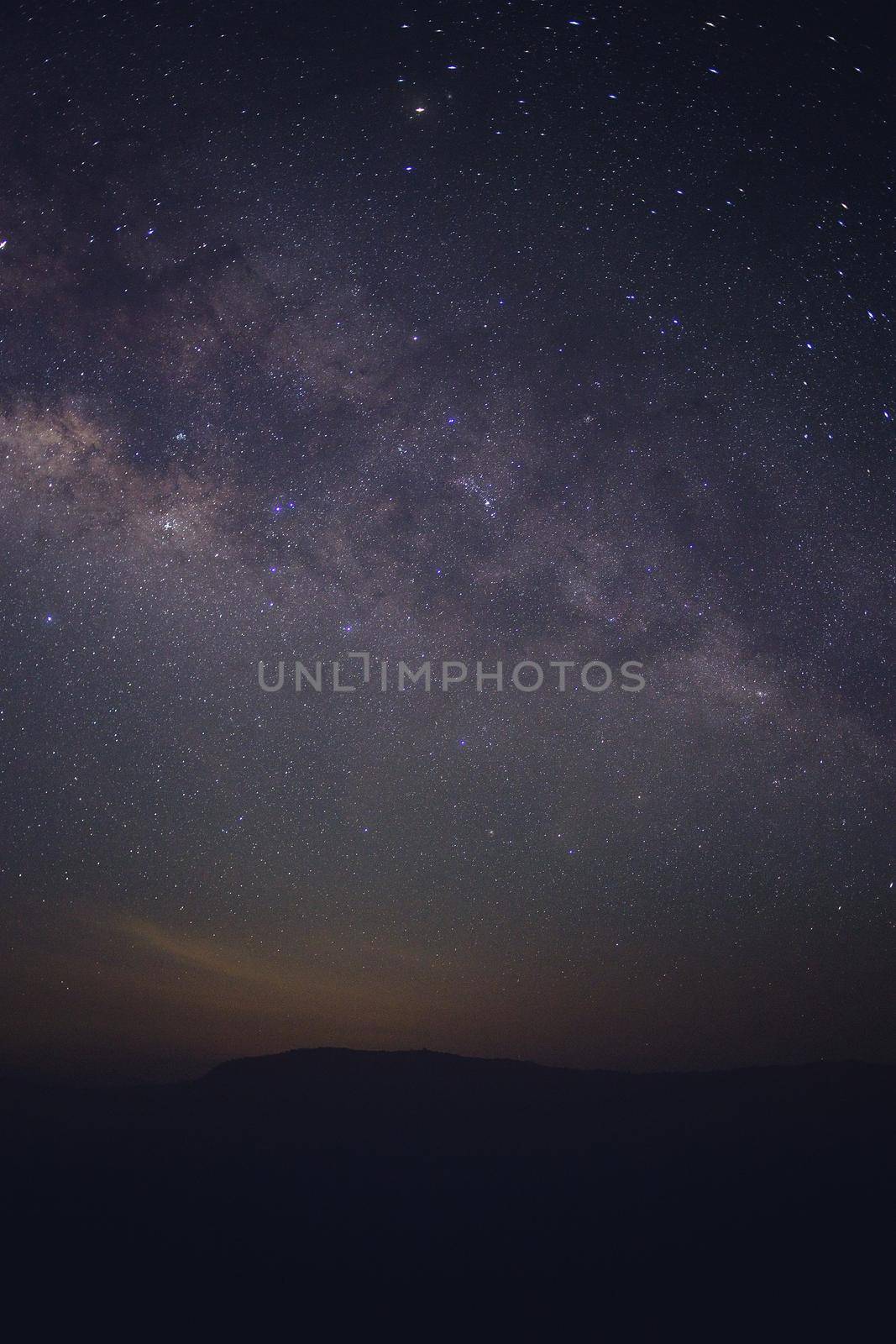 Clearly Milky way above the lake and mountain. Pha Dang Luang view point, Mae Ping National park.Thailand