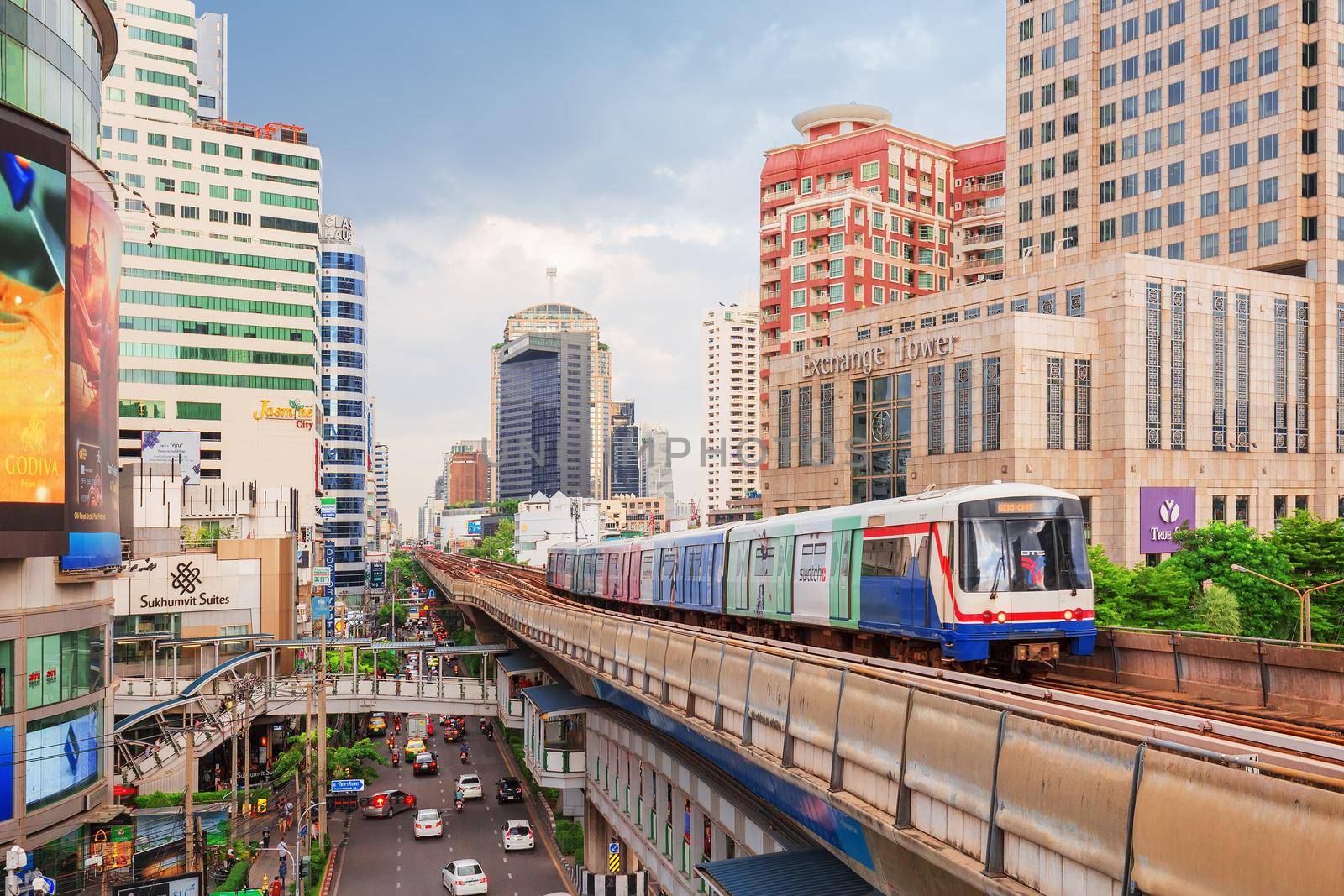 BANGKOK, THAILAND -15 July 2017- Bangkok City. Vibrant capital city of Thailand, with BTS skytrains traveling on elevated rails under modern high-rise skyscrapers