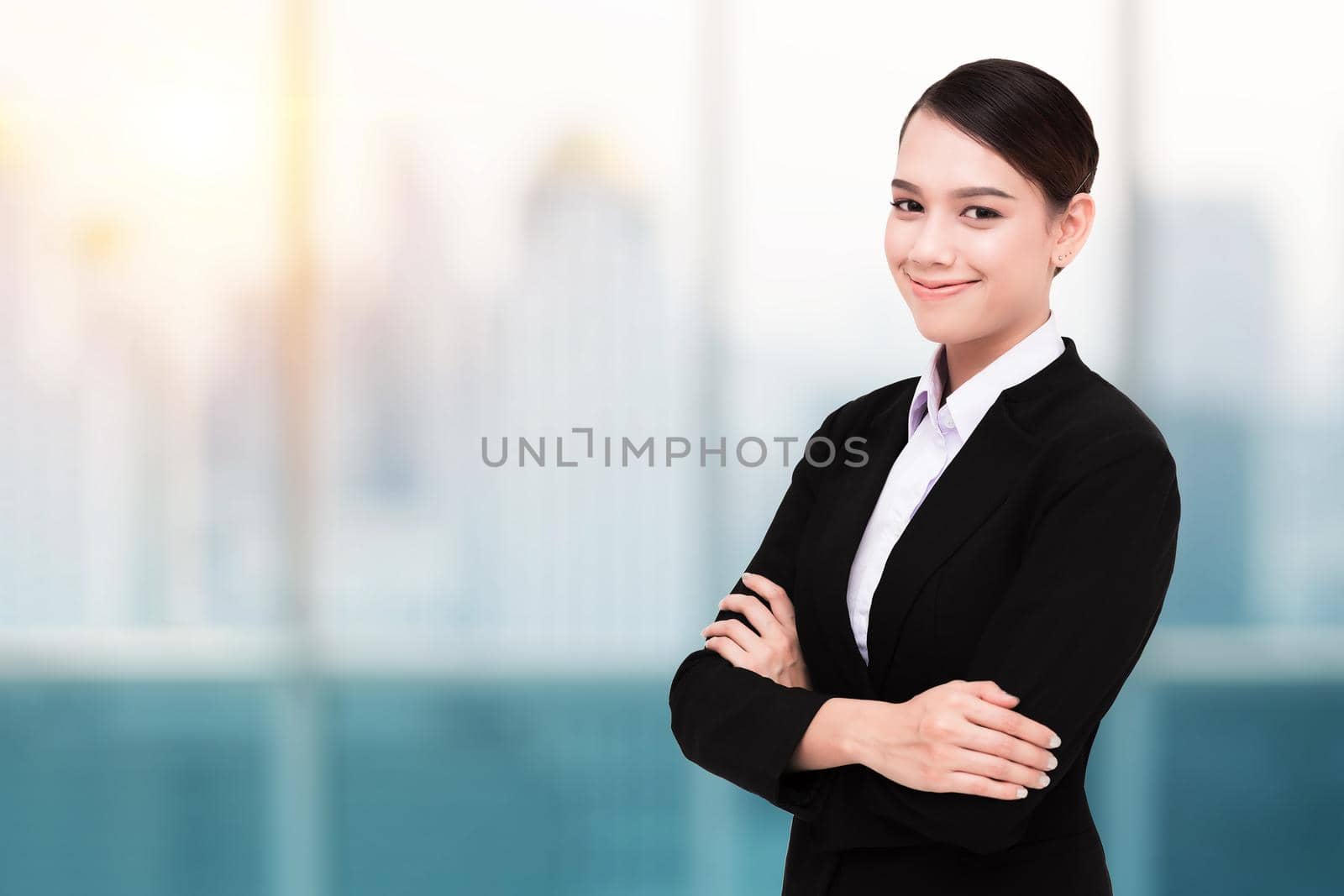 Smiling Pretty Business Woman With Arms Crossed