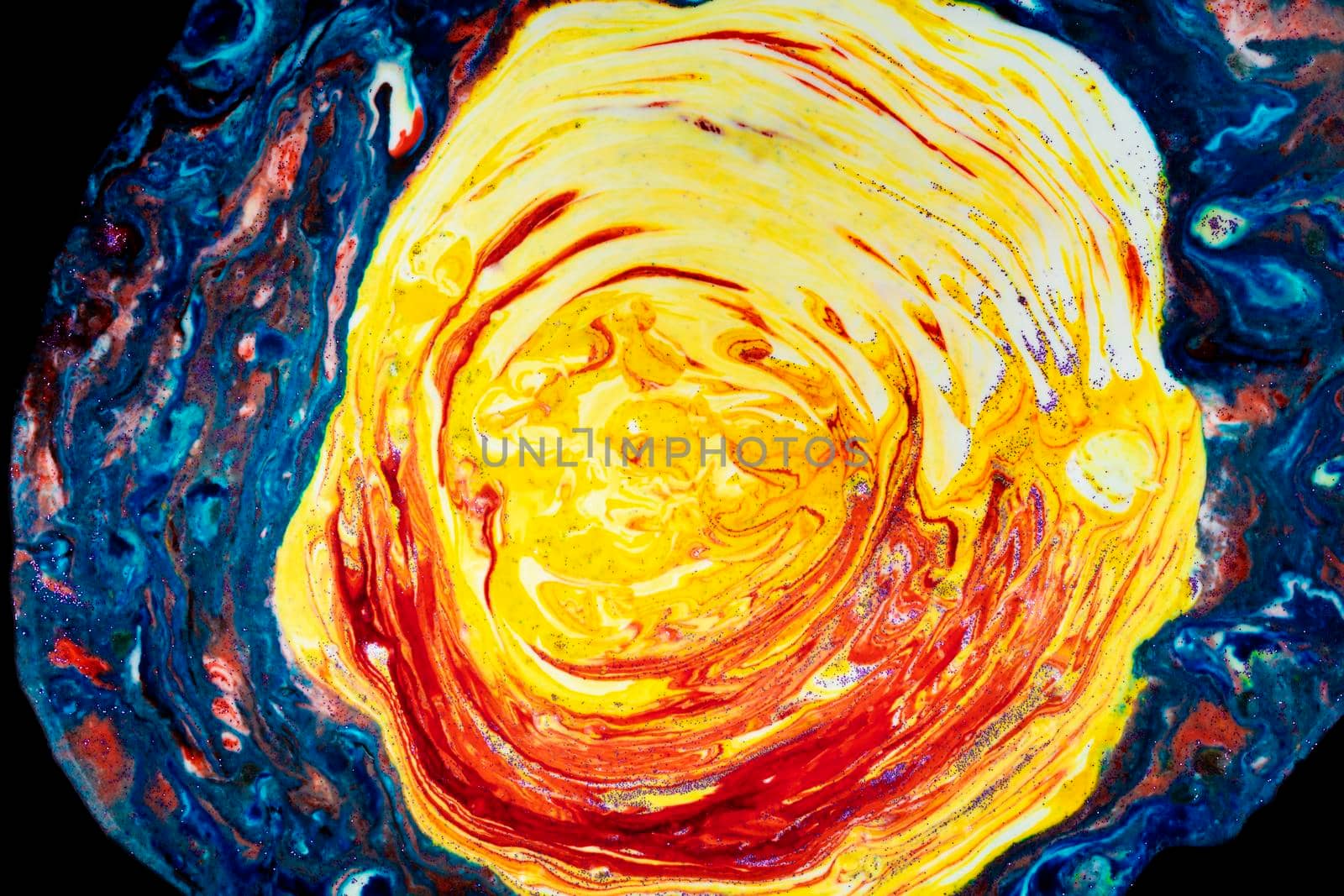 Bright blue acrylic stain with bright yellow. Marble colorful texture. A semicircle smeared with paints that looks like a celestial mantle. Abstract painting.