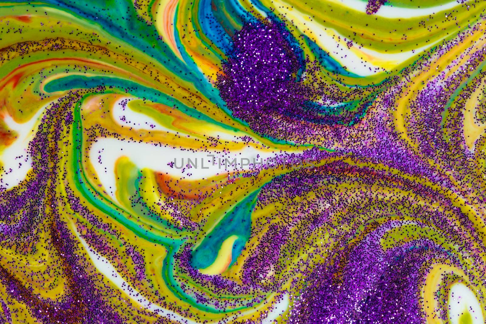 Multicolored acrylic backdrop sprinkled with purple sparkles. Contemporary creativity. Colorful avant-garde rich texture. A background made up of many shapes and materials.