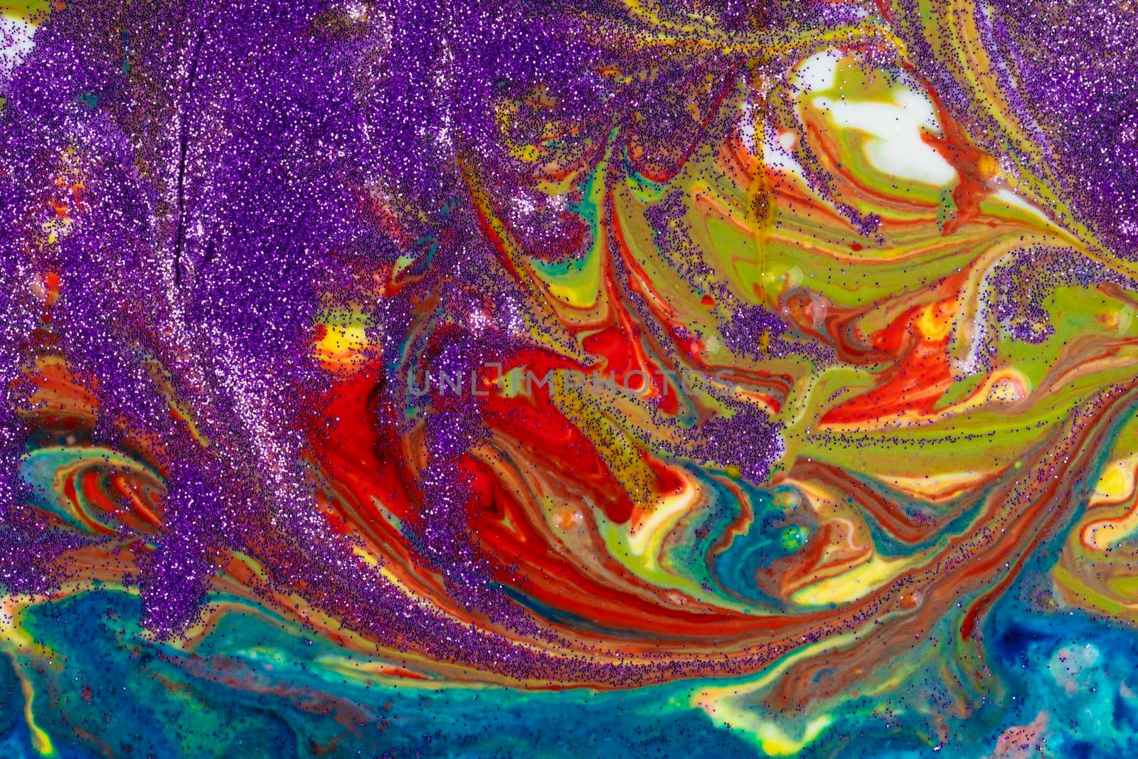 Multicolored acrylic backdrop sprinkled with purple sequins. Contemporary creativity. Colorful avant-garde texture. A background made up of many textures, shapes and materials.