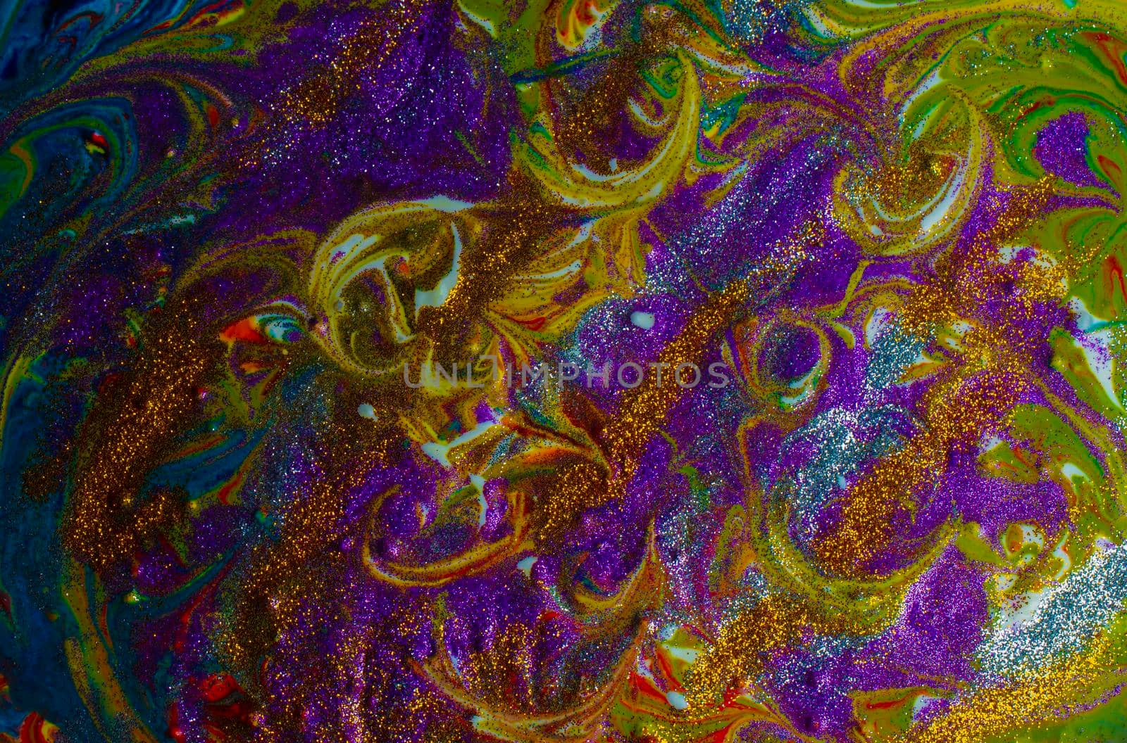 Multicolored acrylic background with curls sprinkled with purple and gold sparkles. Contemporary oriental art. A colorful avant-garde painting with rich texture. A background made up of many shapes and materials.