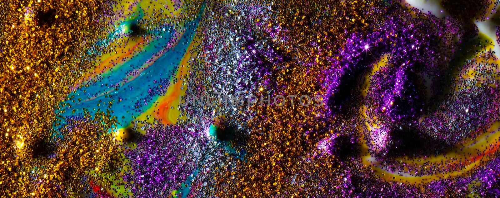 Multicolored banner: on a dark background, sprinkled with purple and gold sparkles with streaks and waves. Contemporary creativity. A colorful avant-garde painting with rich texture. A background made up of many shapes and materials.