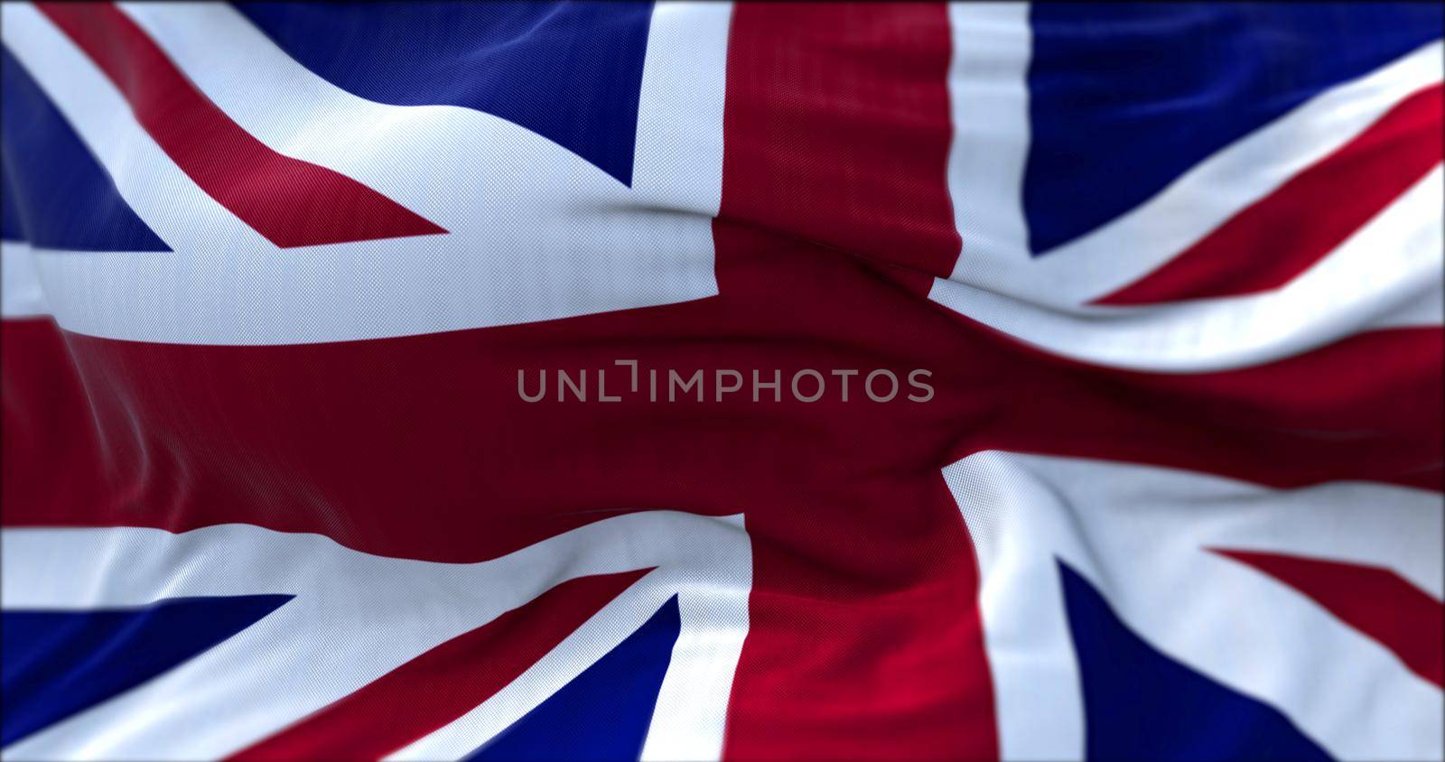 close up view of the United Kingdom flag waving in the wind. Selective focus.