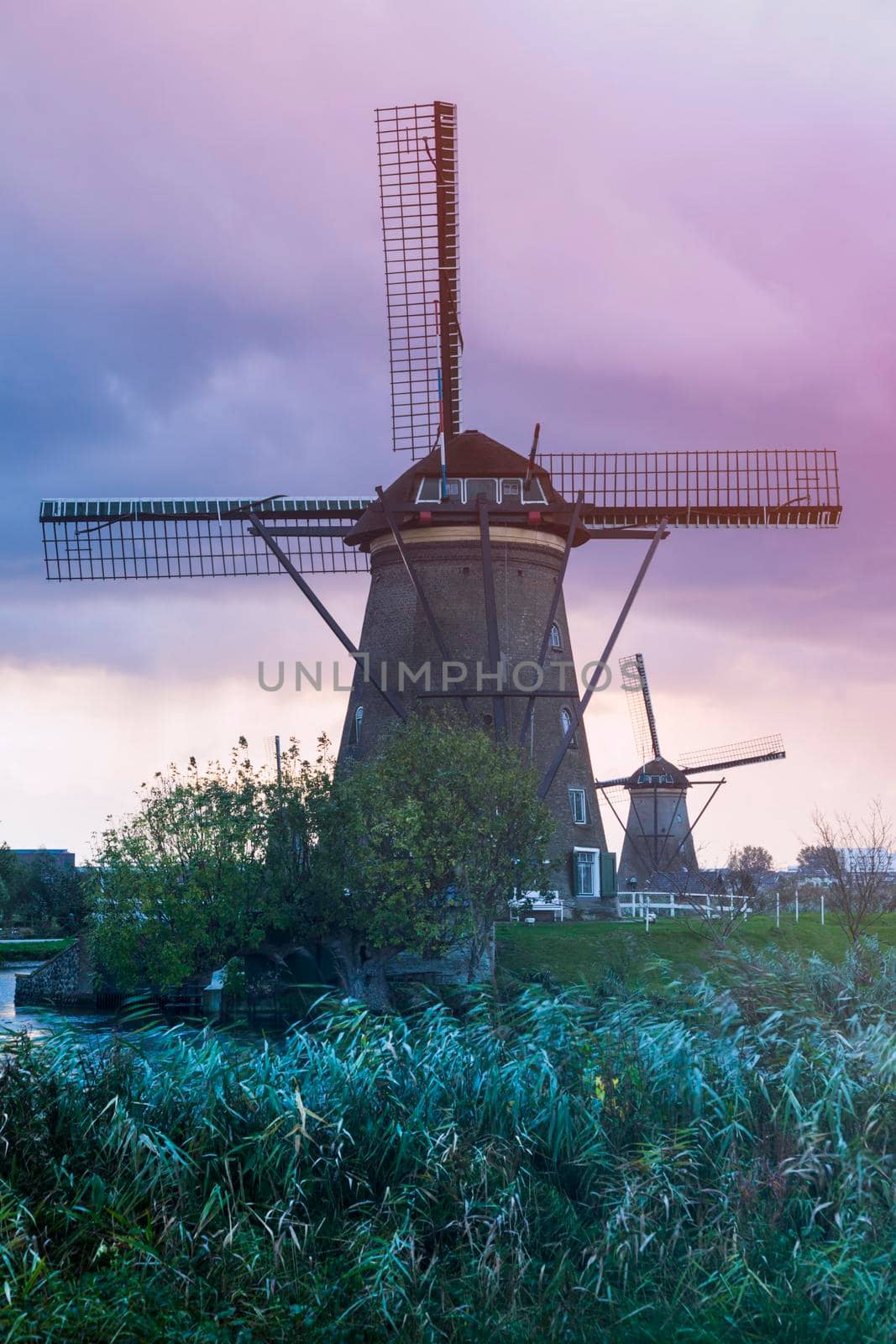 Windmills at Kinderdijk seen during sunset. Kinderdijk, South Holland, Netherlands