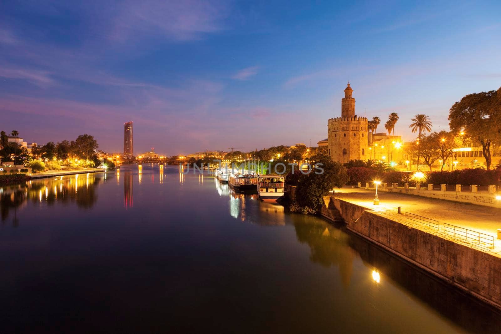 Golden Tower in Seville at evening. Seville, Andalusia, Spain.