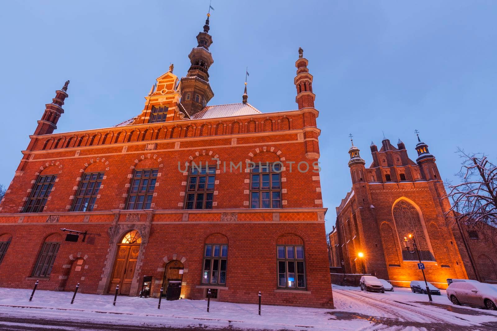 Old city hall and St. Joseph Church at night. Gdansk, Pomerania, Poland.