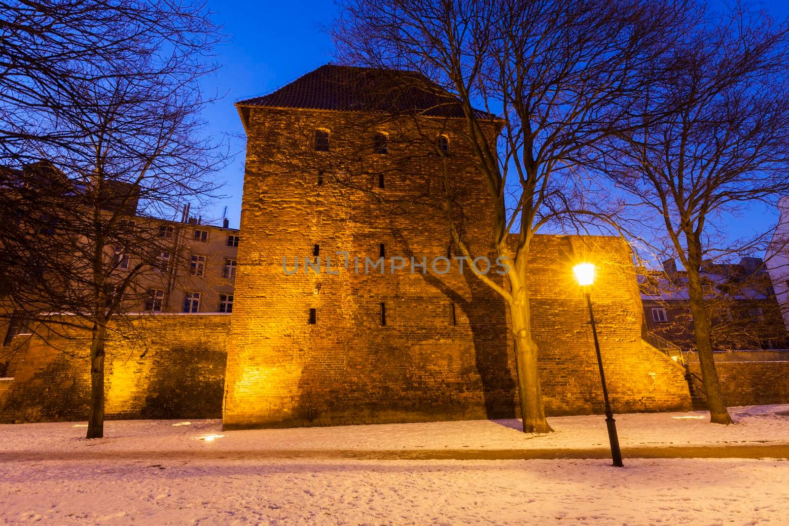 Old walls of Gdansk at night. Gdansk, Pomerania, Poland.