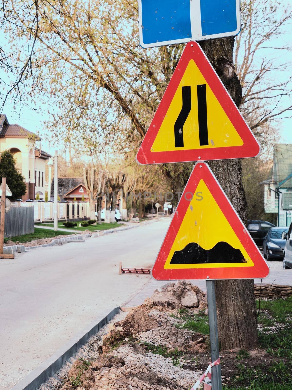 Road signs. Road works. Replacement of the road surface.