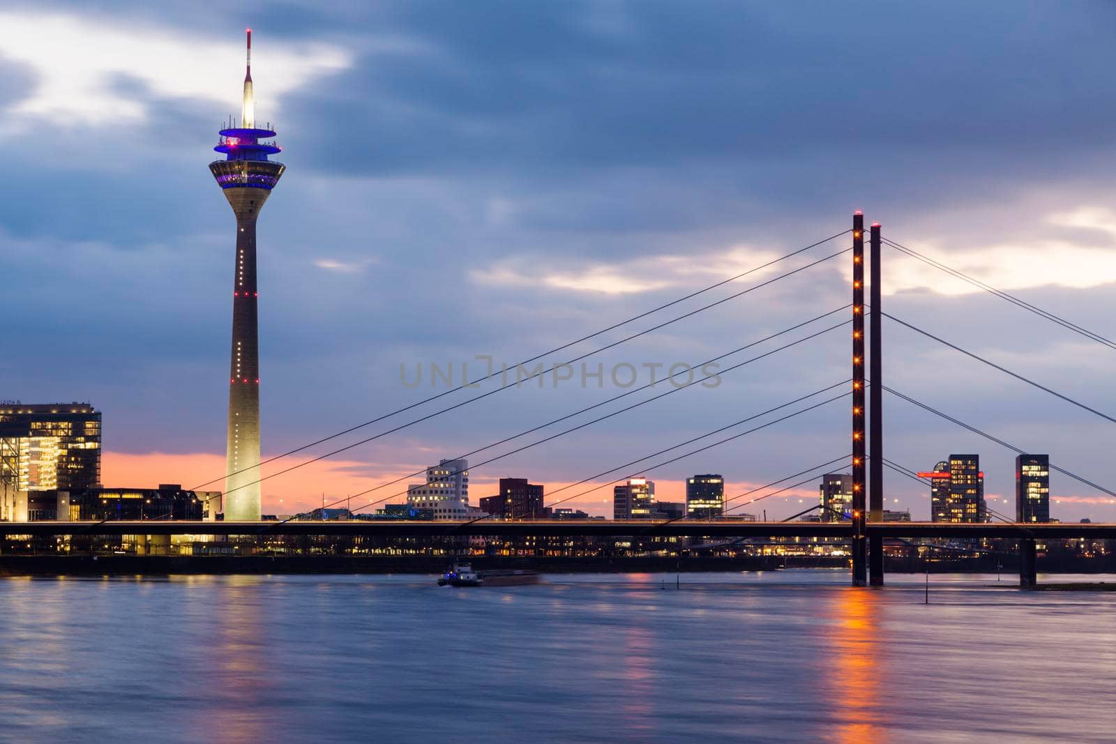 Rheinknie Bridge and Rhine Tower in Dusseldorf. Dusseldorf, North Rhine-Westphalia, Germany.