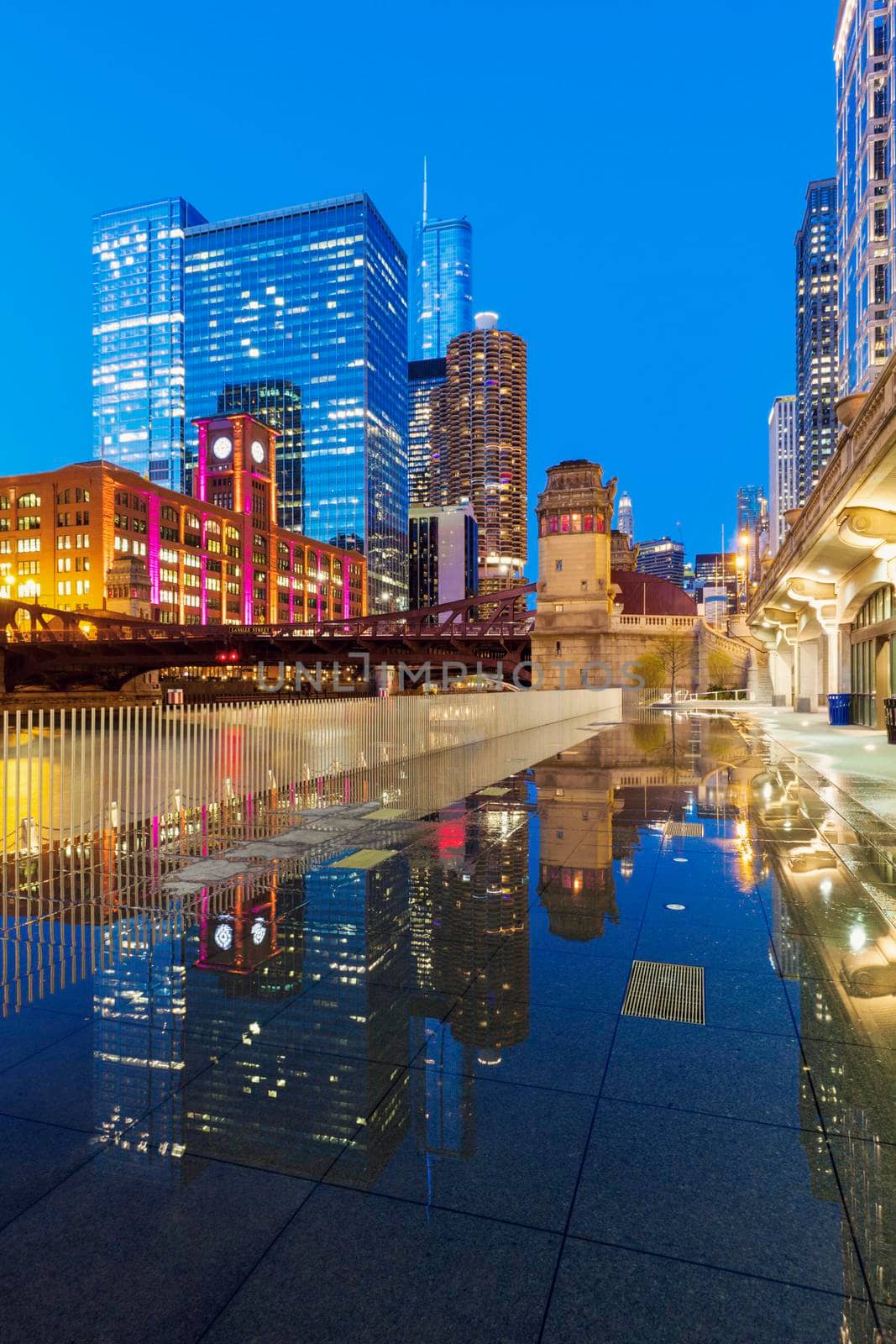 Colorful architecture of Chicago along Chicago River at night. Chicago, Illinois, USA.