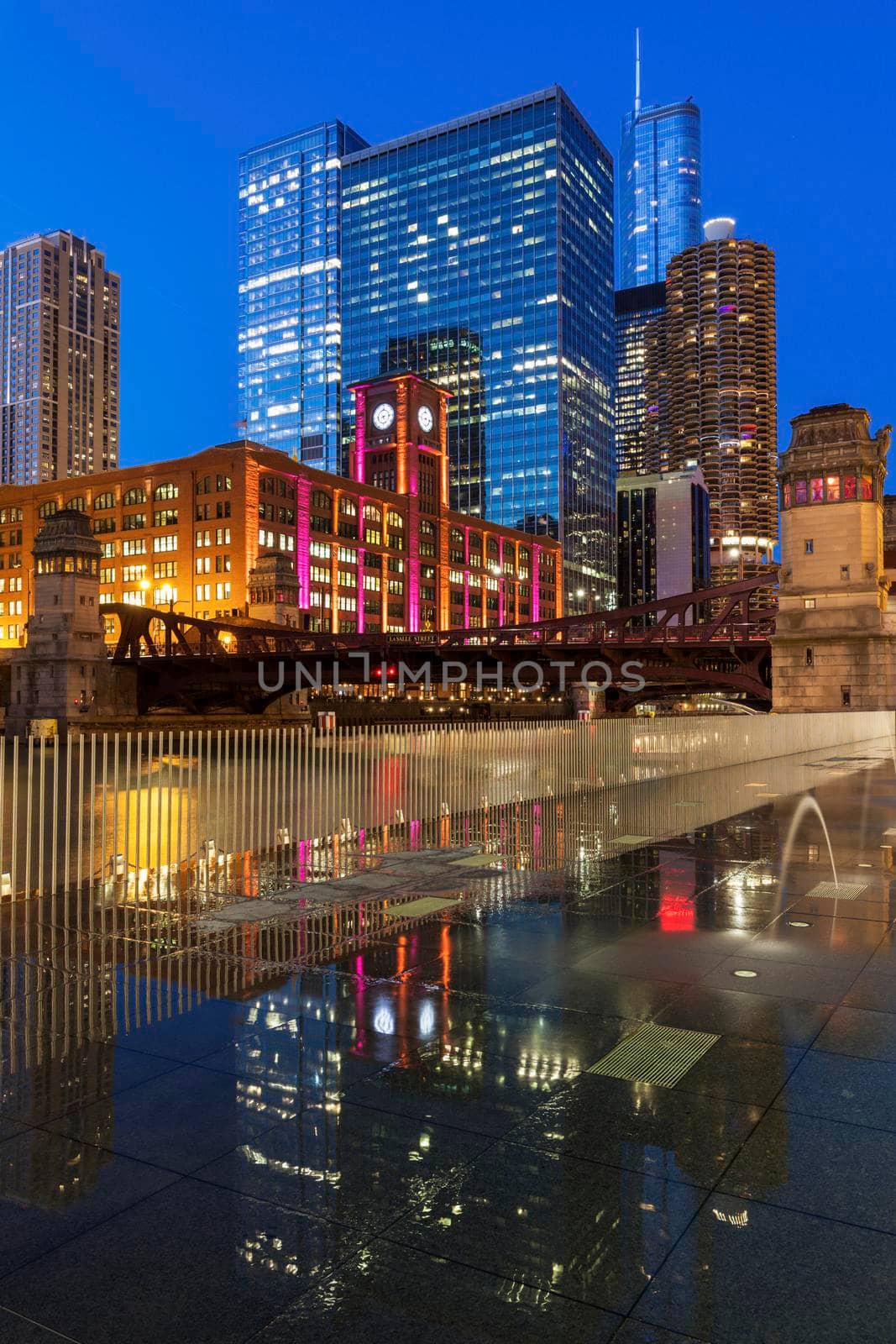 Colorful architecture of Chicago along Chicago River at night. Chicago, Illinois, USA.