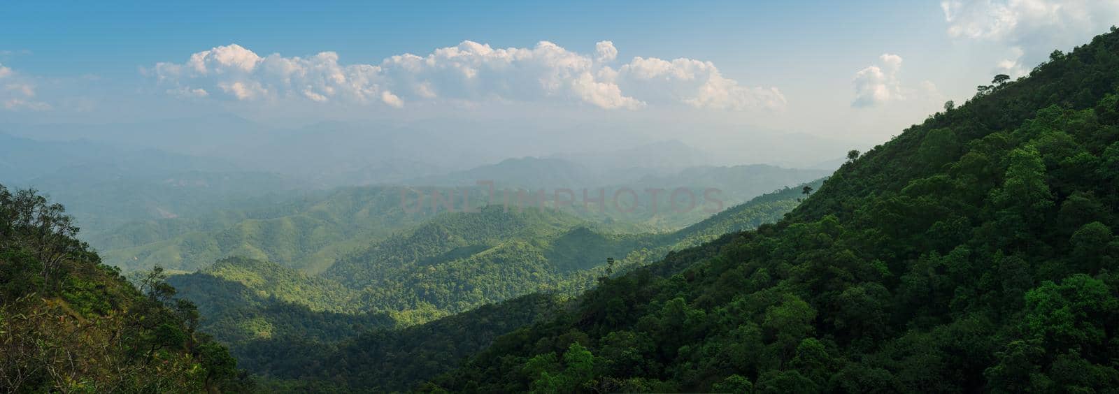 The blue sky and cloudy over the mountain in day