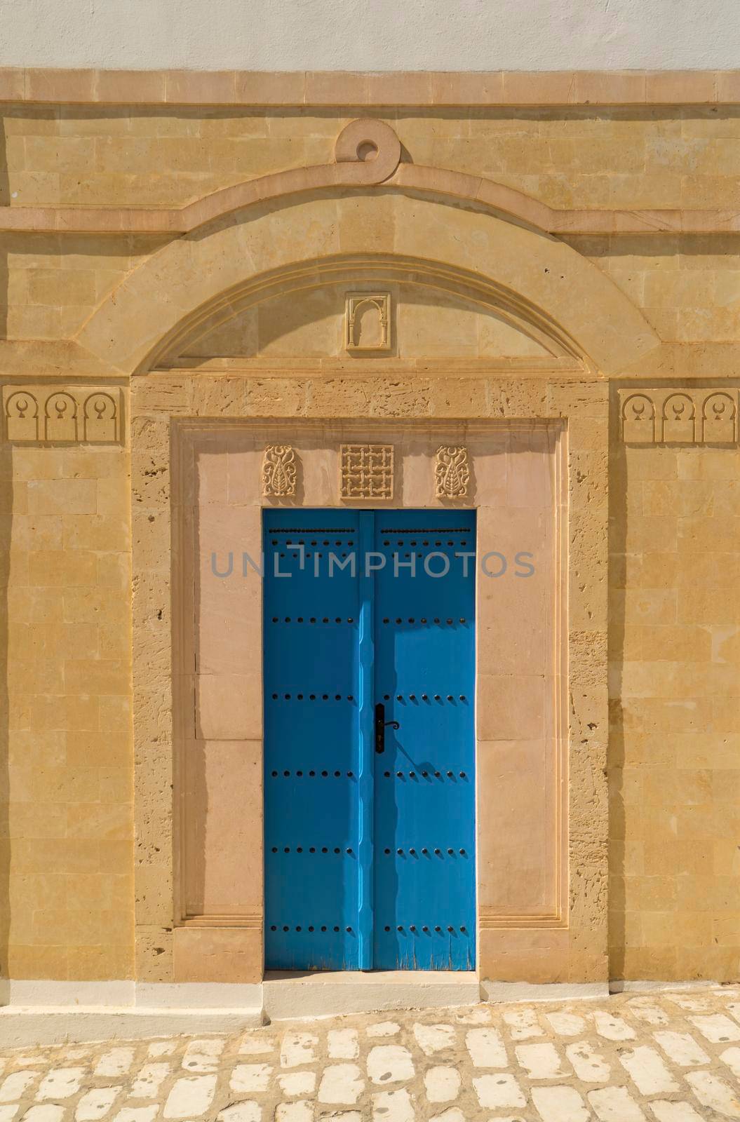 Old Blue door with arch from Tunisia. Sidi Bou Said
