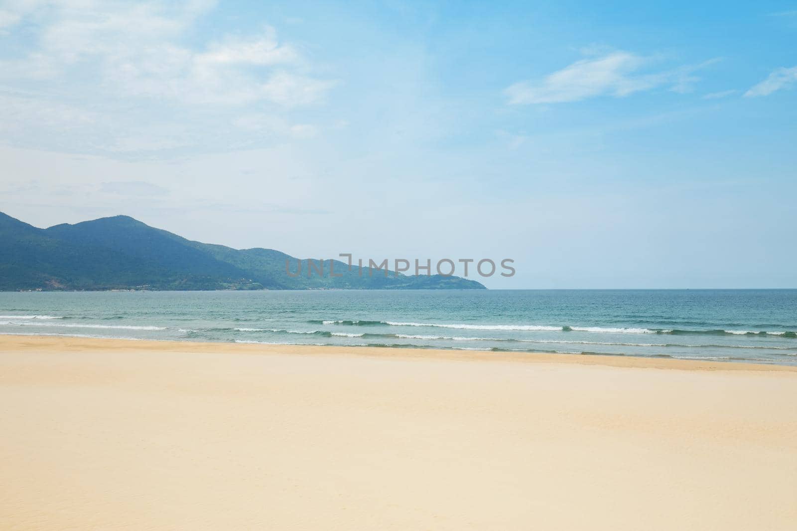 Tropical sandy beach at summer sunny day.