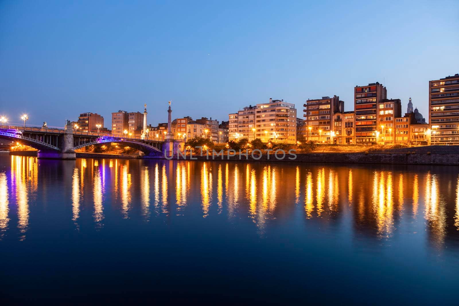 Panorama of Liege along Meuse River seen at evening. Liege, Wallonia, Belgium.
