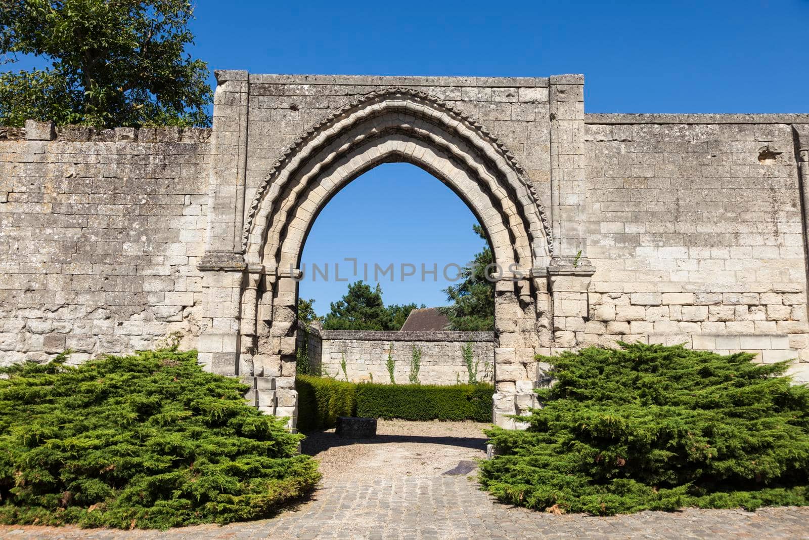 Gate by St Nicolas Abbey in Saint-Leu-d'Esserent. Saint-Leu-d'Esserent, Hauts-de-France, France.