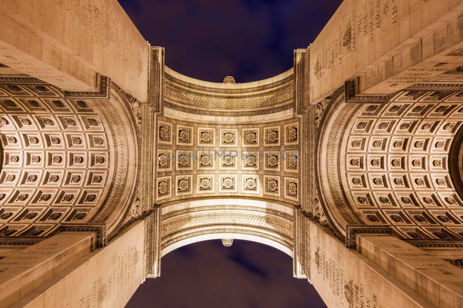 Arc de Triomphe in Paris seen at night. Paris, Ile-de-France, France.