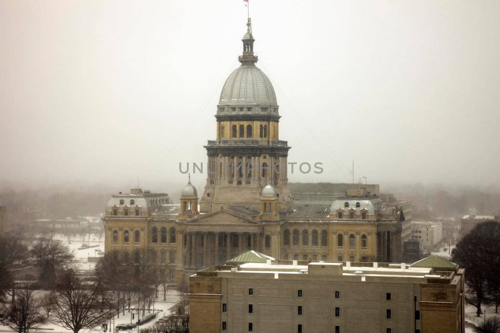 Illinois State Capitol Building  - aerial view during the snowstorm. Springfield, Illinois, USA. 