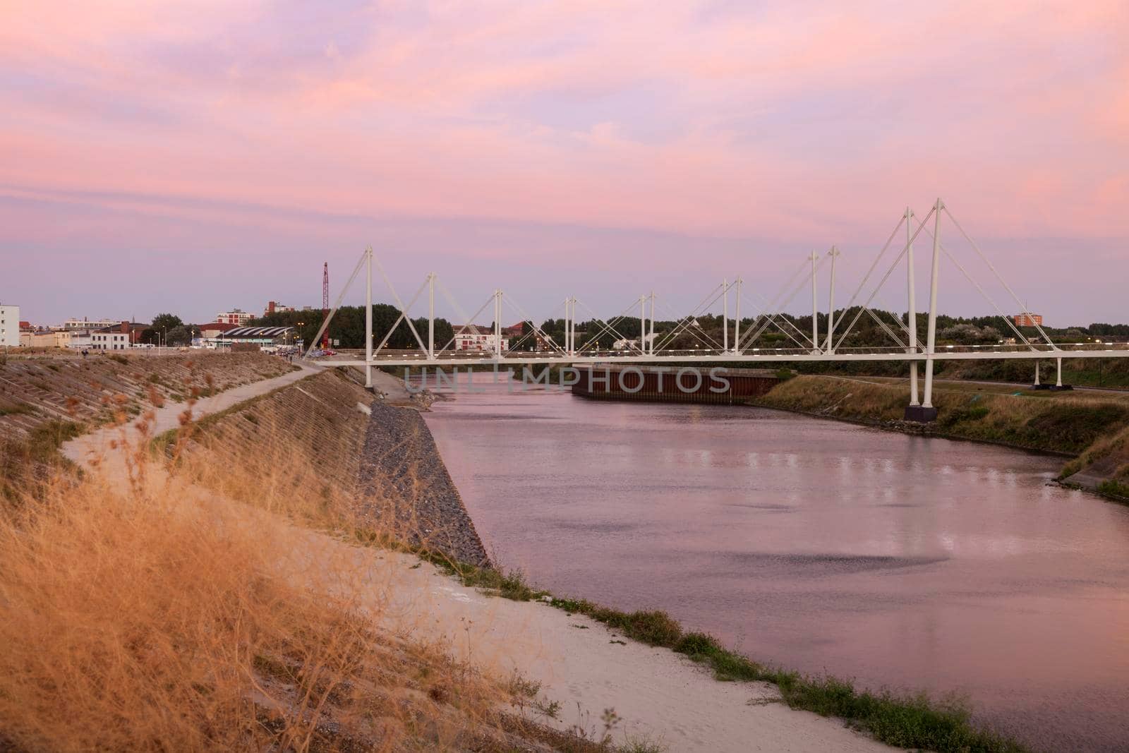 Pedestrian bridge in Dunkirk at sunset. Dunkirk, Hauts-de-France, France.