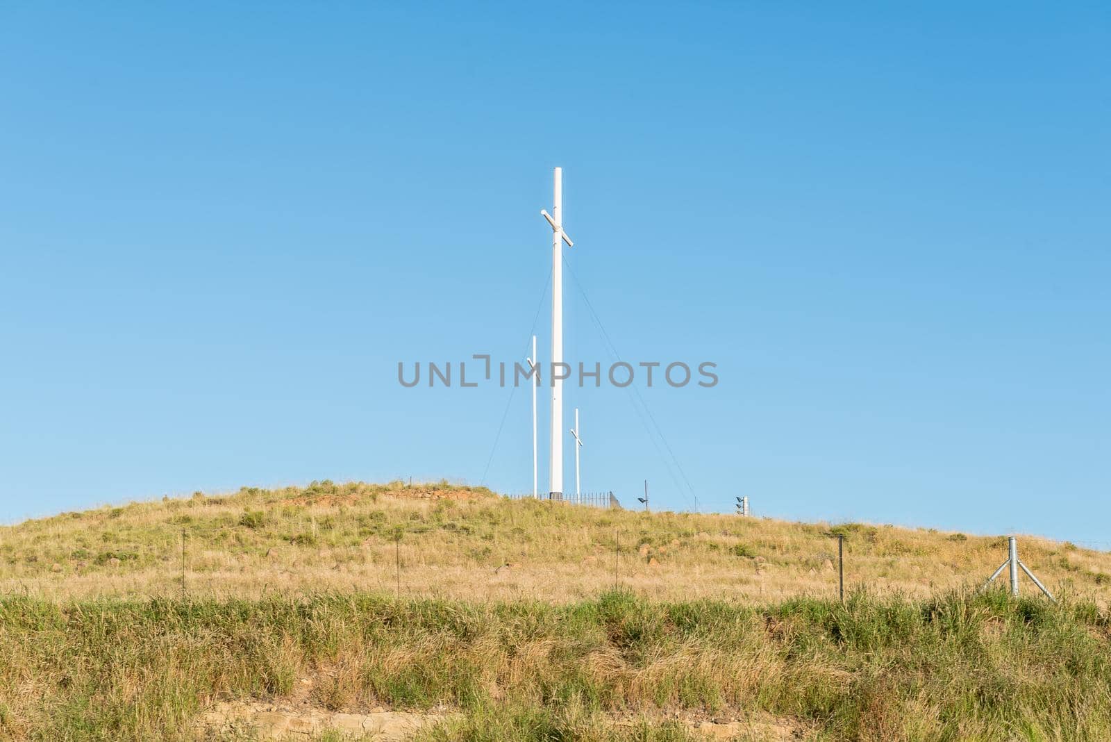 Three crosses on hill next to road N1 at Trompsburg by dpreezg