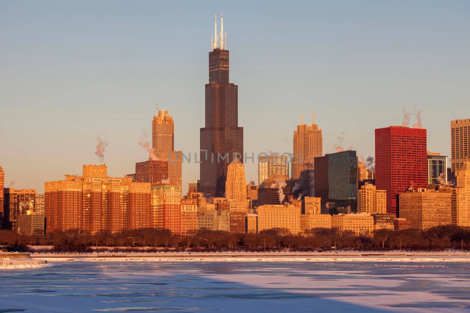 Winter in Chicago - skyline at sunrise. Chicago, Illinois, USA.