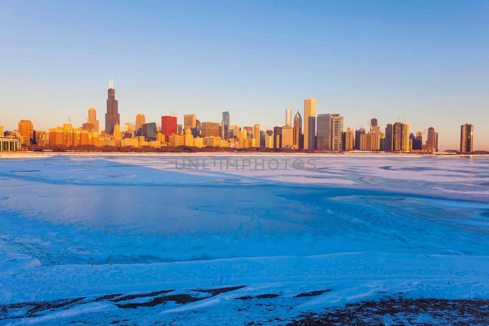Winter in Chicago - skyline at sunrise. Chicago, Illinois, USA.