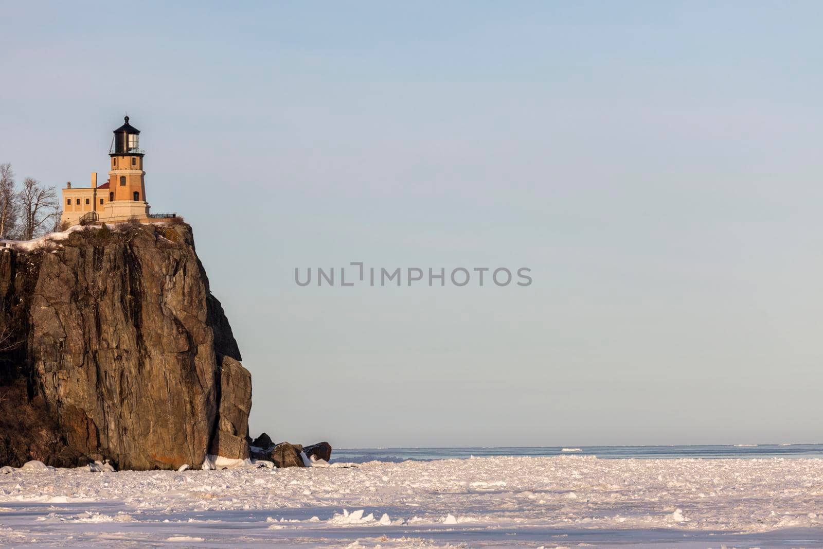 Split Rock Lighthouse and frozen Lake Superior. Minnestota, United States.
