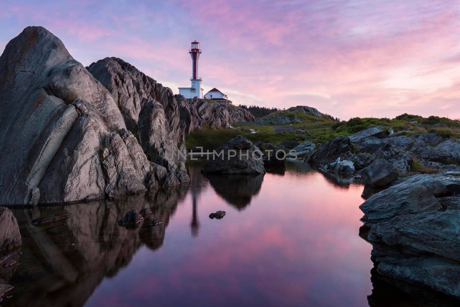 Cape Forchu Lighthouse at sunrise. Nova Scotia, Canada.