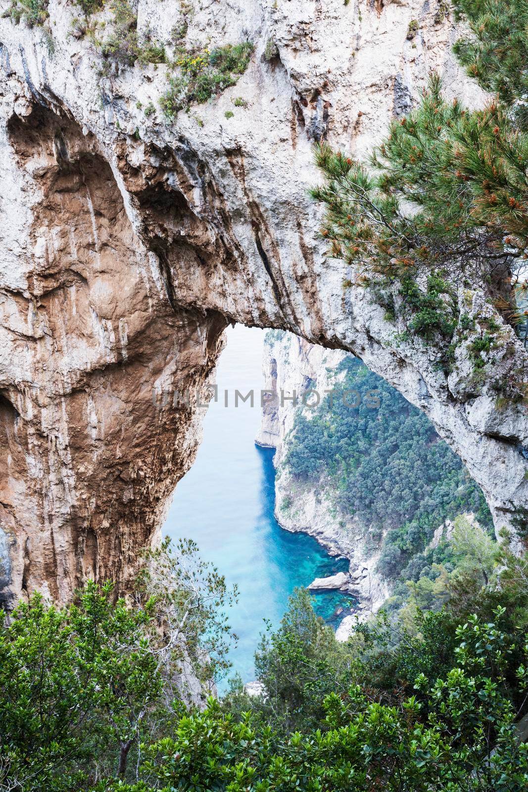 Rock arch on Capri Island. Capri, Campania, Italy.