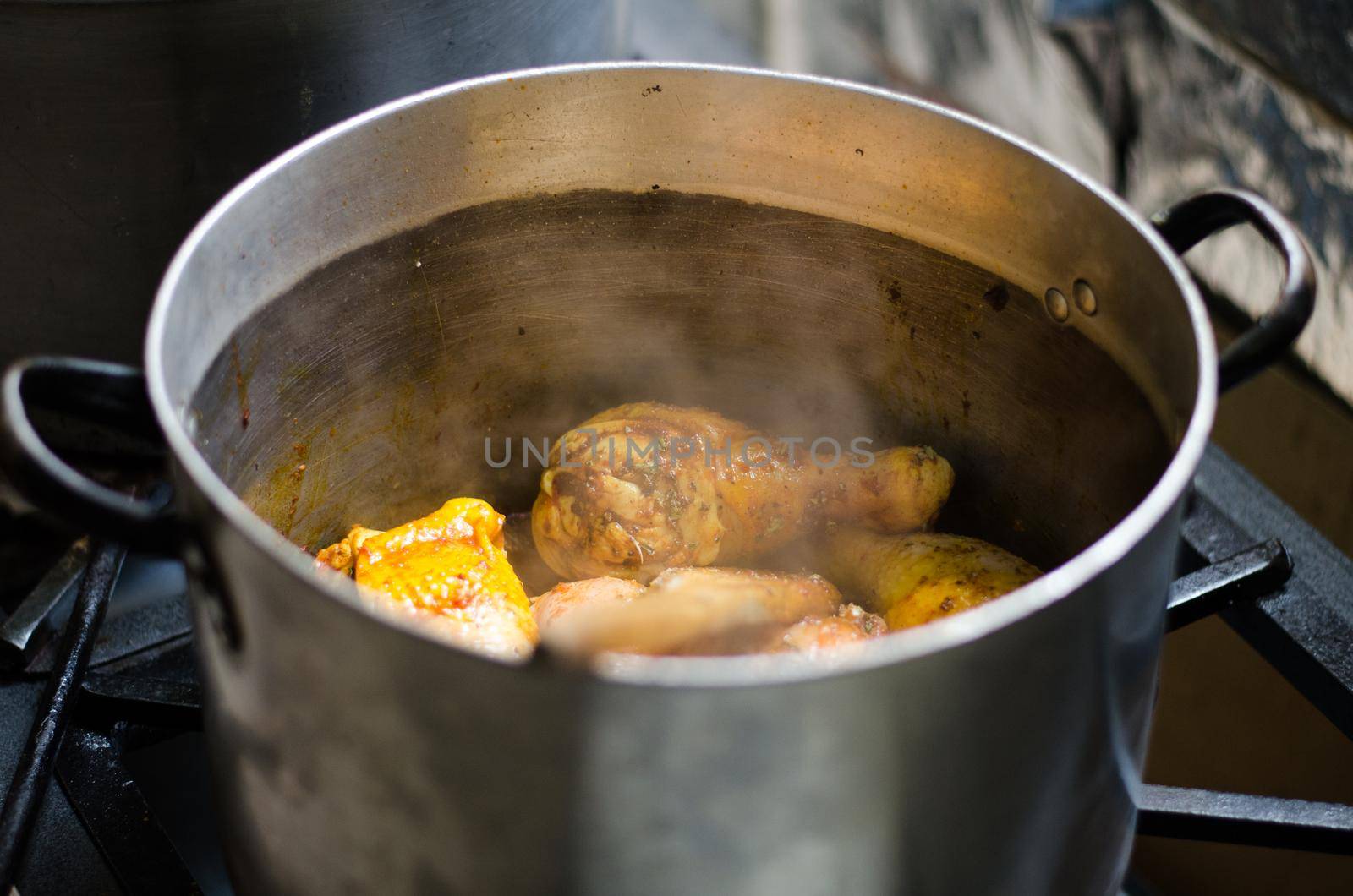 Fried chicken stew. Skillet Fried chicken with vegetable. Crispy fried chicken meat. Top view. slow-cooker chicken meat.
