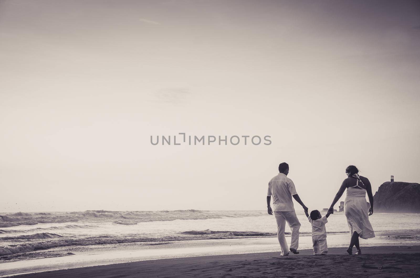 Happy family enjoying sunset in the summer leisure in Lima - Peru