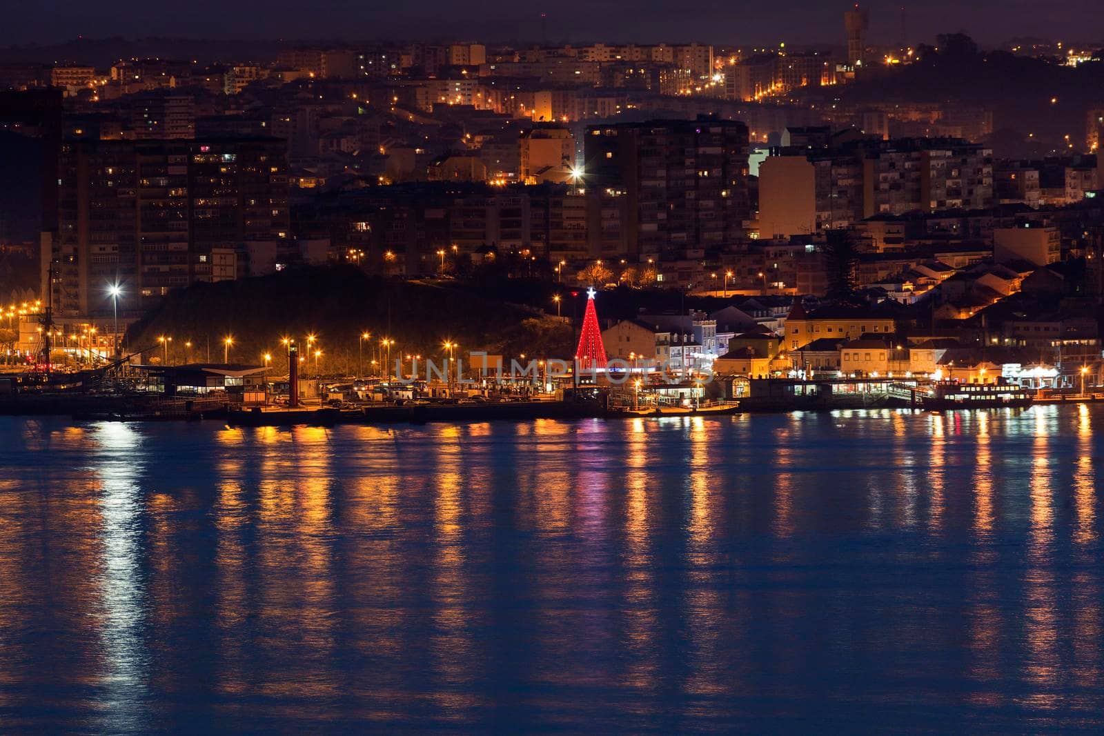 Panorama of Almada from Lisbon at night. Almada, Lisbon, Portugal.