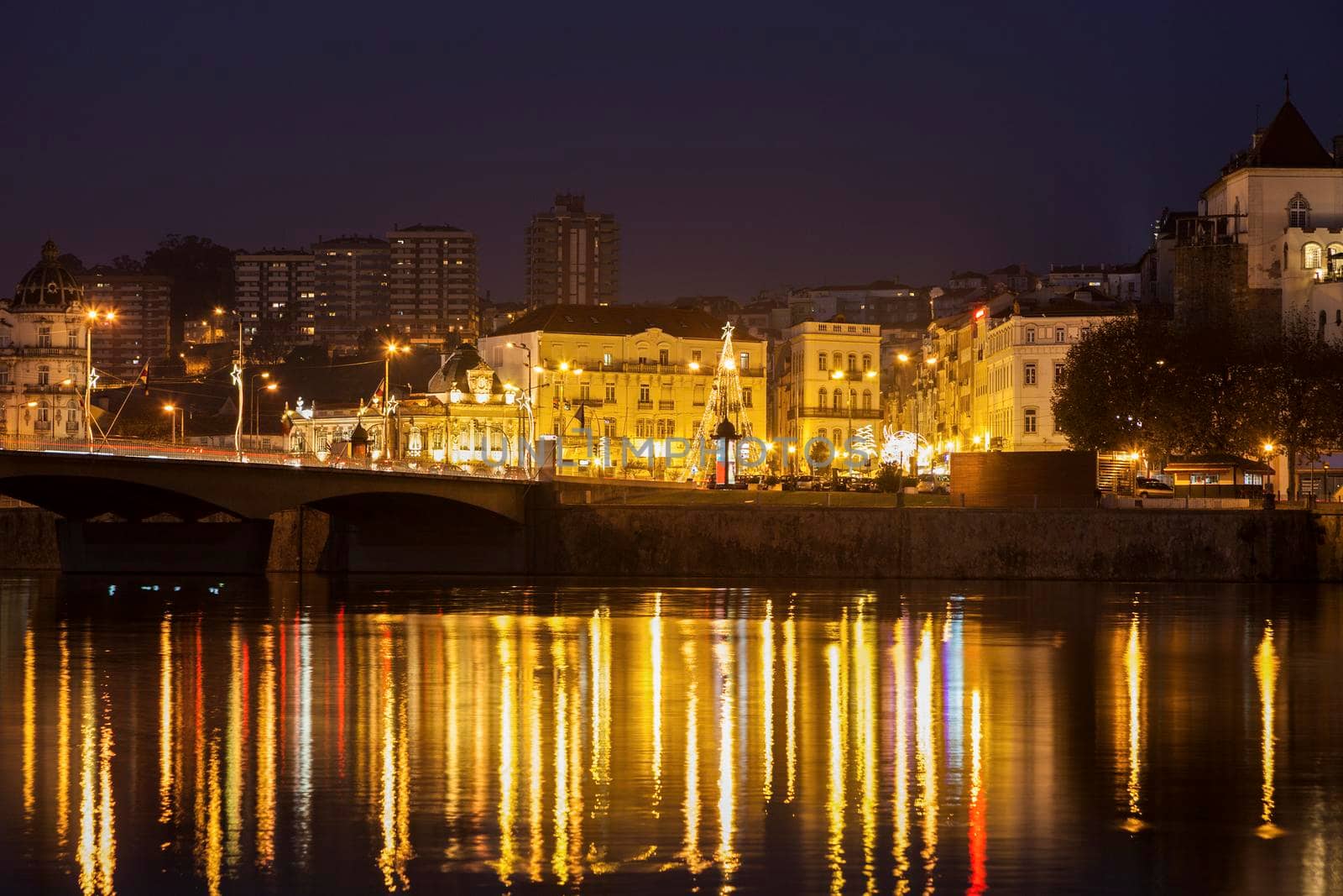 Panorama of Coimbra across Mondego River. Coimbra, Centro Region, Portugal.