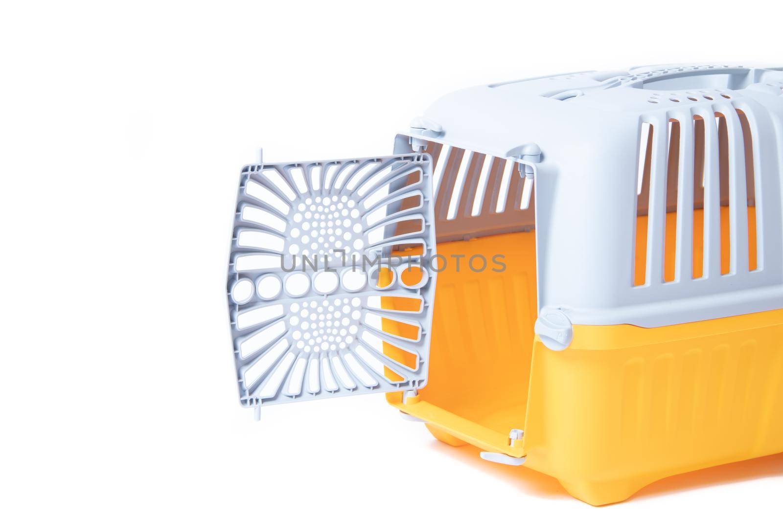 Carrier for cats and small dogs isolated on a white background. safe transportation of animals, article about the transportation of animals. Isolated white background. Gray plastic carry for cats. Veterinary Medicine Article about veterinarians