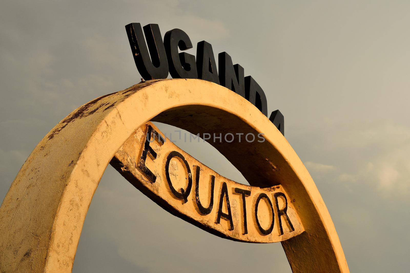 The Equator line on an Ugandan road by silentstock639